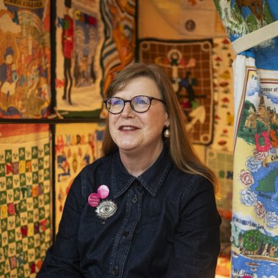 Artist Holly Searle sits inside the Wendy House